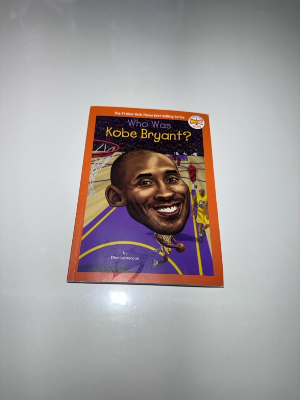 Who Was Kobe Bryant? Paperback Book - Orange & Purple Cover Basketball